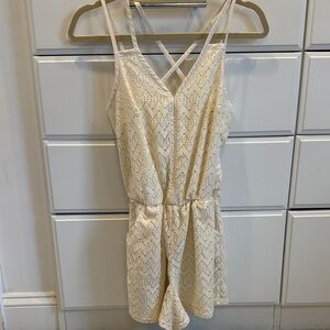 Lace-Trim Cream Romper with Crisscross Back and pockets size-Small